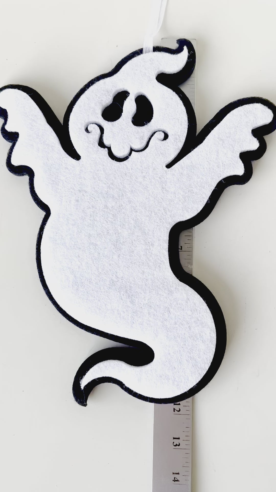 Cute white ghosts crafts, felt sheets, scissors, thread, needles on an old  wooden background. Easy Halloween felt ghosts decor. Halloween sewing  project for kids Stock Photo by ©OnlyZoia 123188402